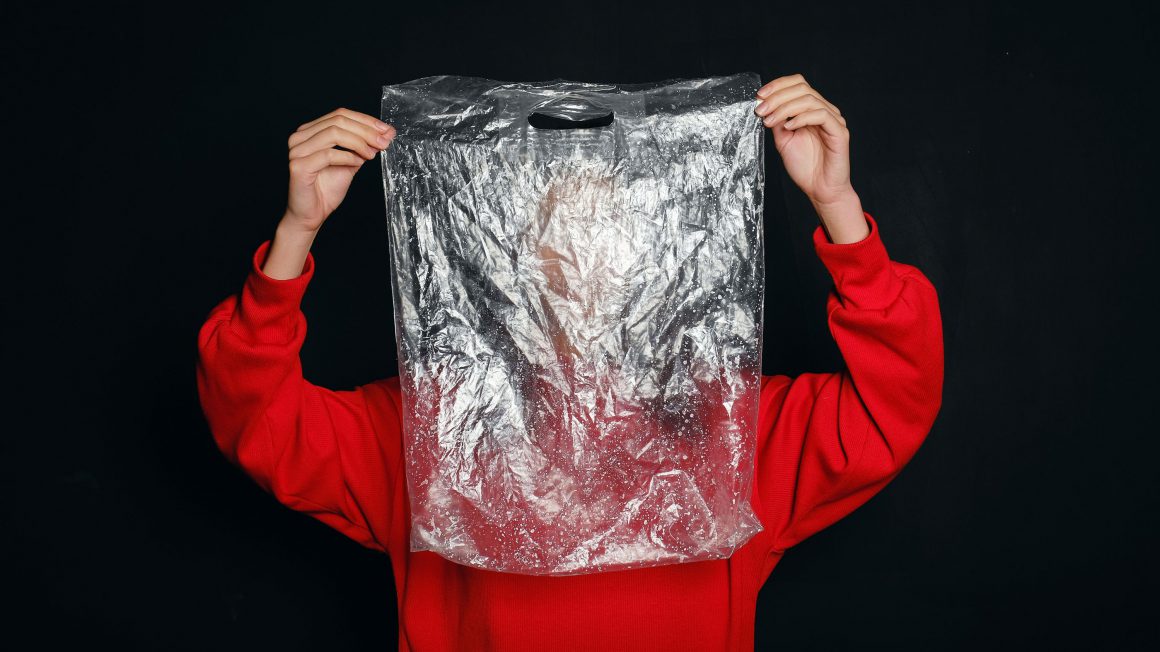 person-holding-a-plastic-bag-3645507
