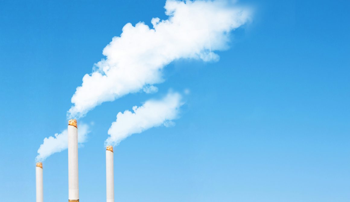 ์No Smoking Concept : Abstract image of White smoke floating and emission from chimney that made from many cigarettes with blue sky in background.