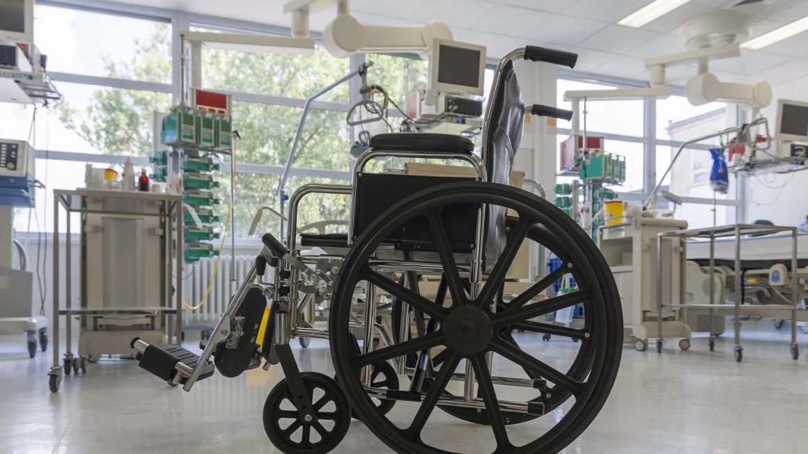 Wheelchair in  intensive care unit in hospital,  a place where can be treated patients with pneumonia caused by coronavirus covid 19.