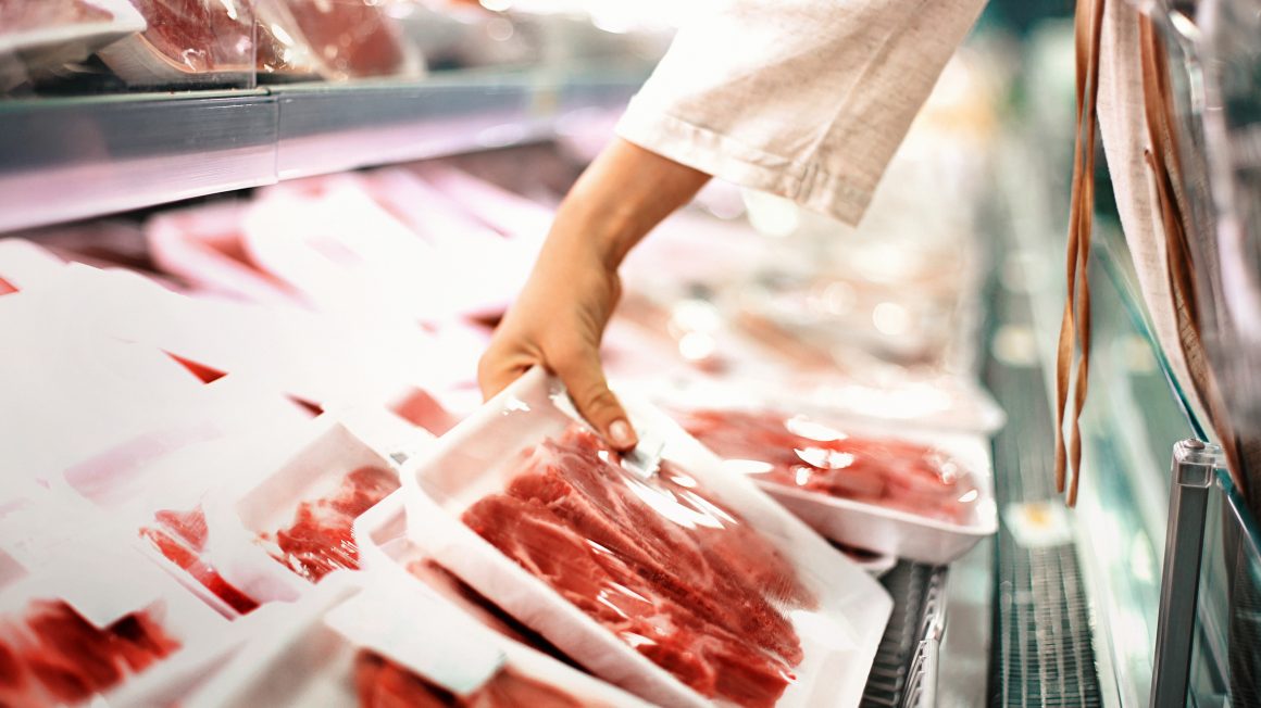 Buy meat in a supermarket.