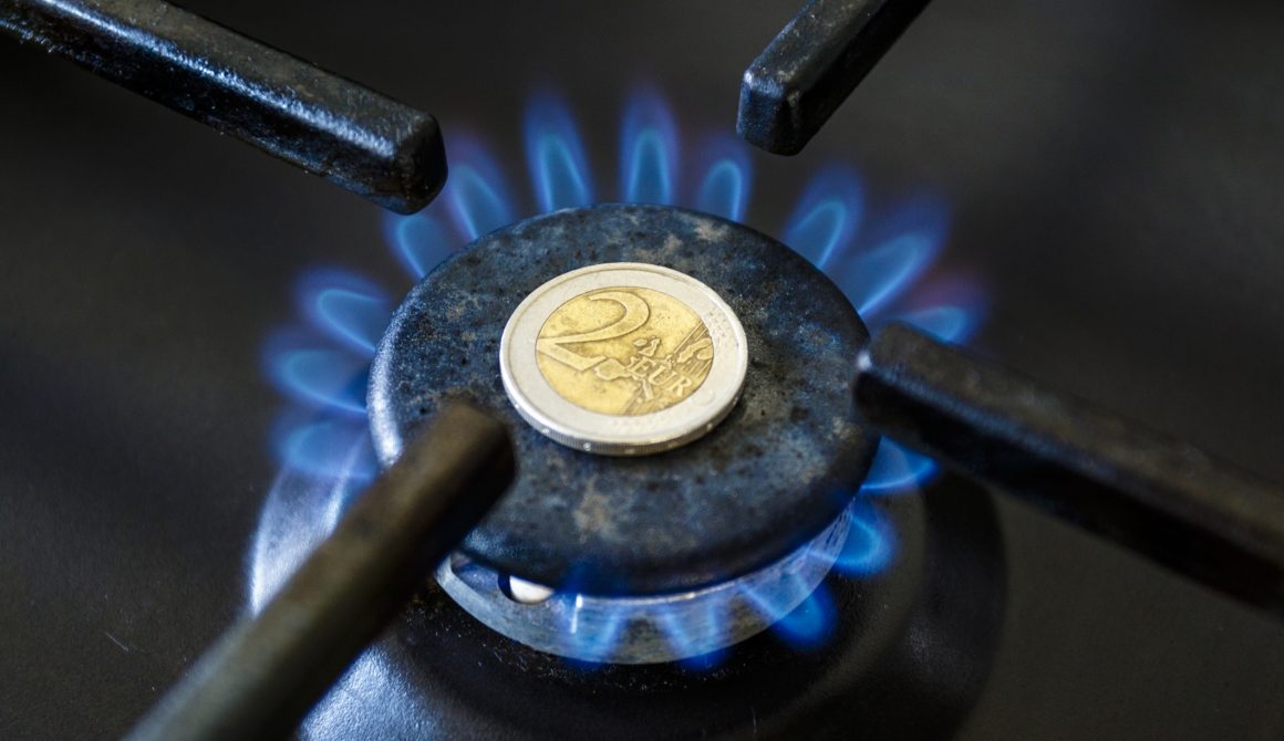 Increase in the cost of the gas bill – euro coin and gas stove turned on